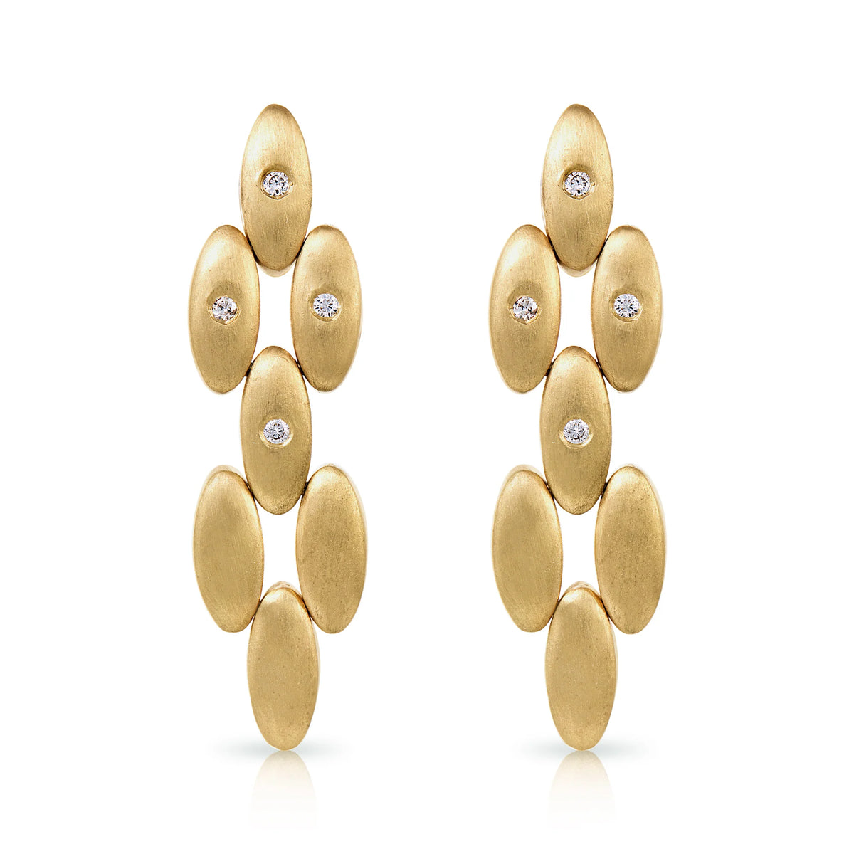 Product Shot of Onirikka Surf Rider Statement earrings in yellow gold on a white background.