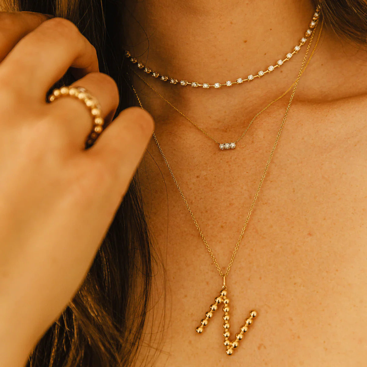 close up of Dana Rebecca Designs Ava Bea Bar Necklace in yellow Gold 