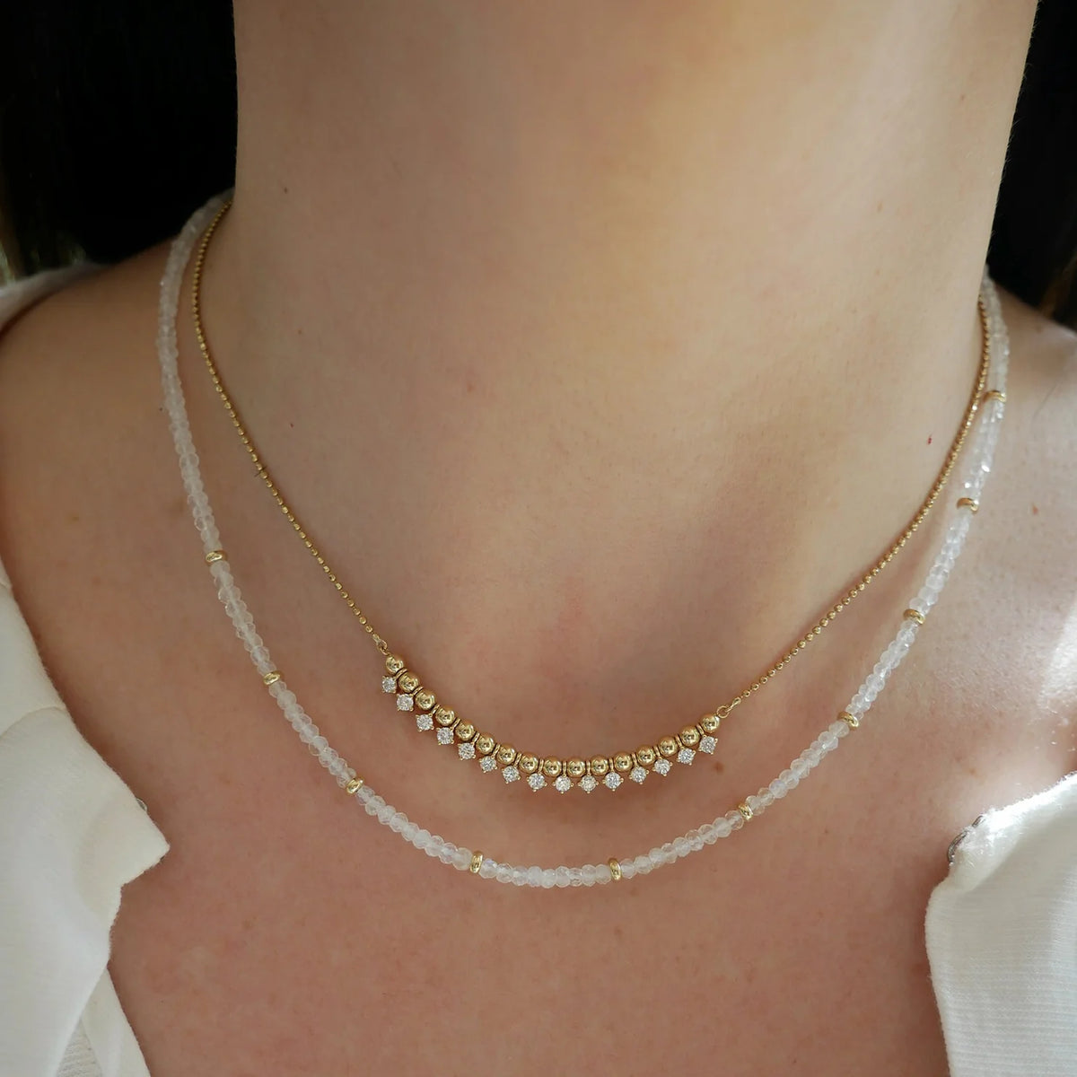 EF-Collection Birthstone Bead Necklace In Moon Stone in yellow gold styled on models neck