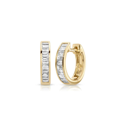 EF-Collection Channel Set Diamond Baguette Huggie Earrings in yellow gold on a white background 