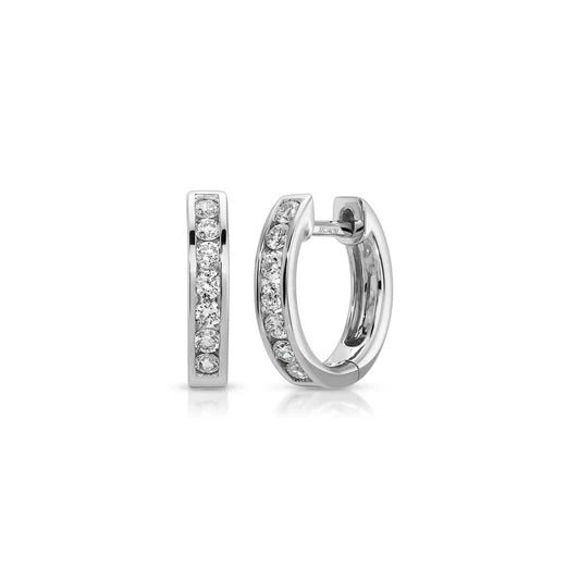 EF-Collection Channel Set Diamond Huggie Earrings in white gold on white background 