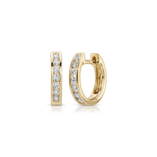 EF-Collection Channel Set Diamond Huggie Earrings in yellow gold on white background 