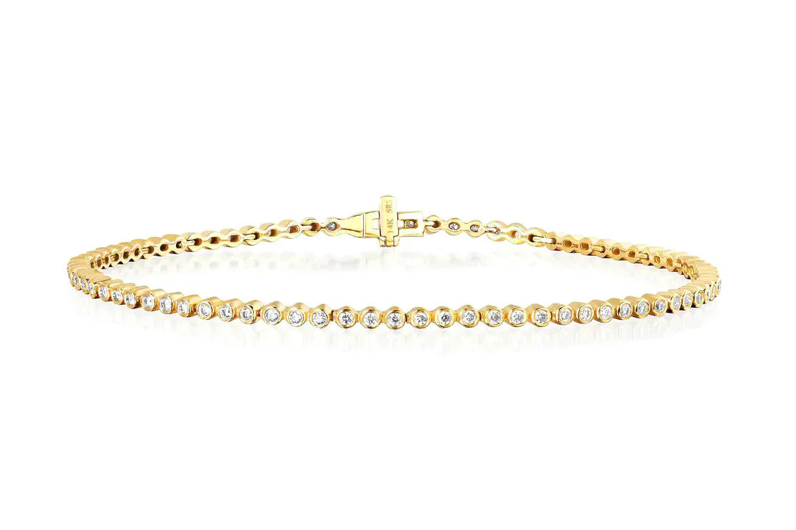 EF Collection Diamond Bezel Eternity Bracelet in yellow gold on white background. 