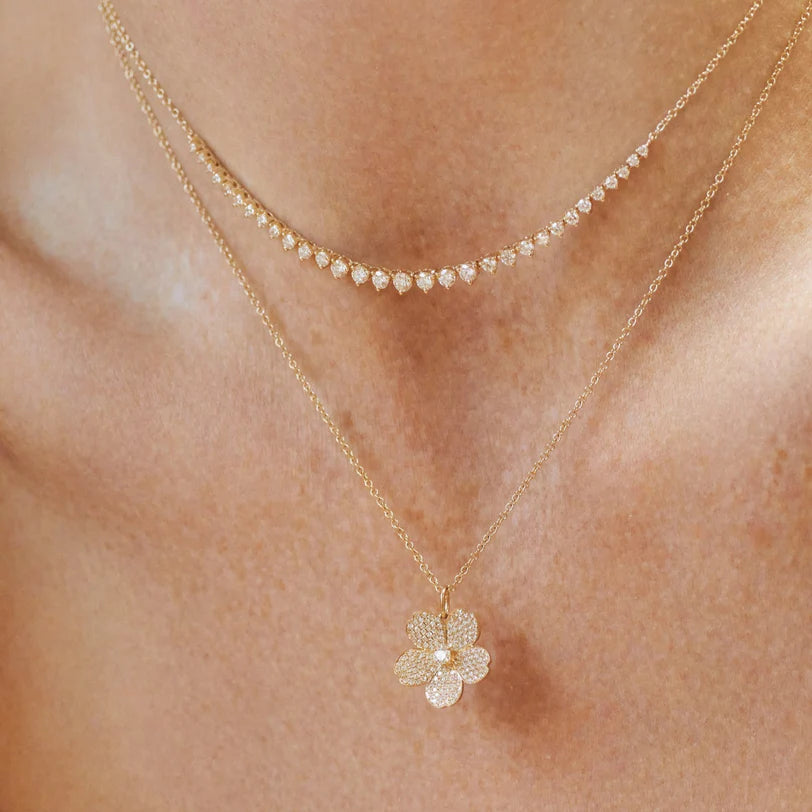 EF Collection Diamond Cherry Blossom Necklace in yellow gold styled on models neck. 