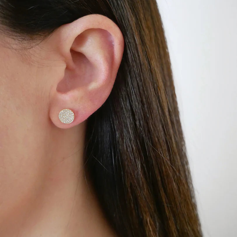 EF Collection Diamond Disc Stud Earrings in yellow gold on models ear. 
