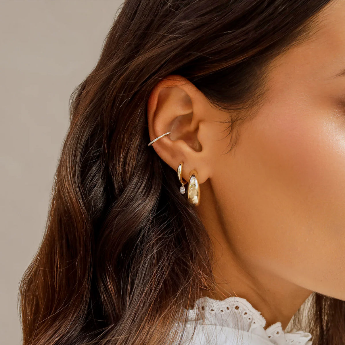 EF-Collection Diamond Ear Cuff Earring in yellow gold styled on models ear 
