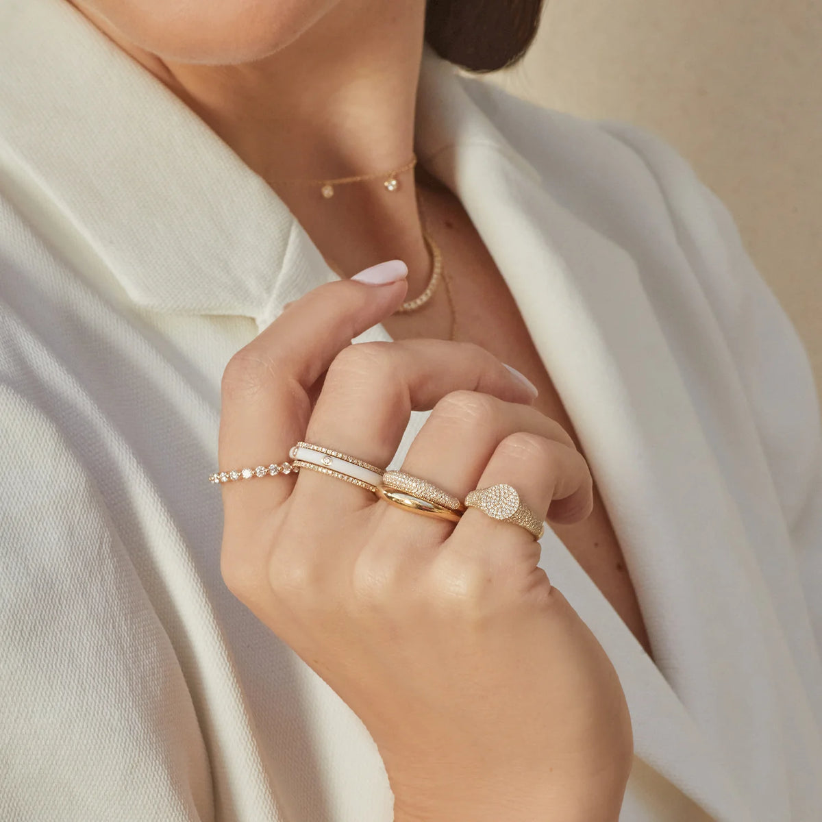 EF-Collection Diamond Eternity Band Ring in yellow gold styled on models finger with other ef-collection rings 
