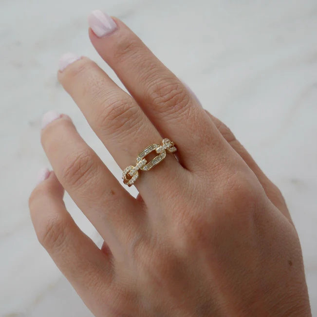 Single EF Collection Diamond Graduated Chain Ring in yellow gold on model’s finger. 