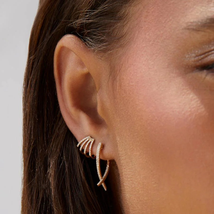 EF-Collection Diamond Loop Hoop Earring in yellow gold styled on models ear 