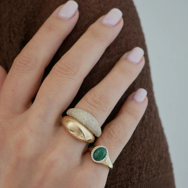 EF Collection Diamond & Malachite Cabochon Signet Ring in yellow gold styled on model’s finger. 