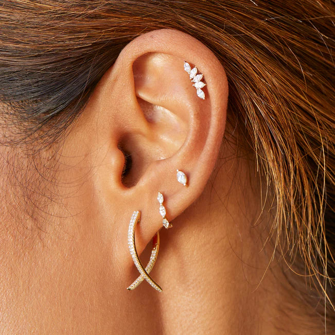 EF Collection Diamond Marquise Stud Earring in yellow gold styled on models ear. 