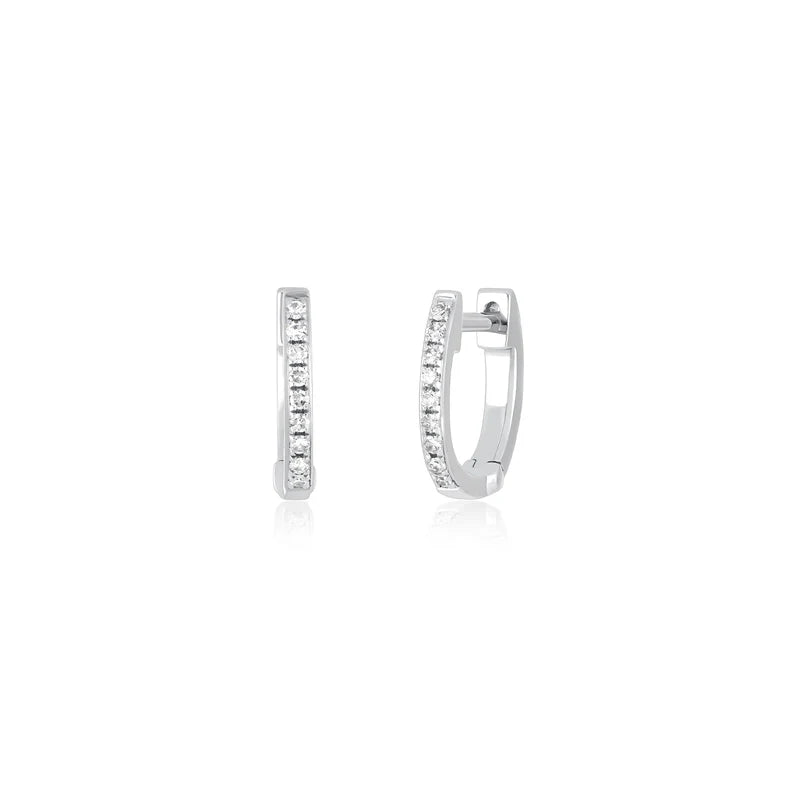 EF-Collection Diamond Mini Huggie Earrings in white gold on white background 