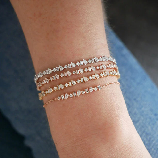 EF Collection Diamond Multifaceted Eternity Bracelet in white, yellow, and rose gold on models wrist 
