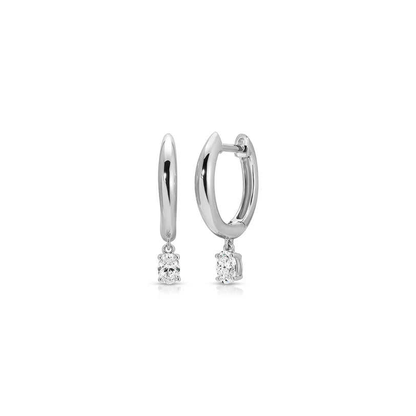 EF Collection Diamond Oval Drop Gold Dome Huggie Earring in white gold on white background. 