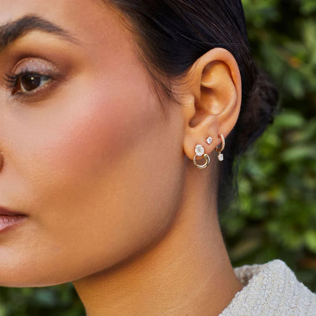 EF Collection Diamond Oval Stud Earring in yellow gold styled with diamond huggies. 