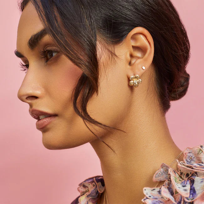 EF Collection Diamond Oval Stud Earring in yellow gold layered with floral statement piece. 