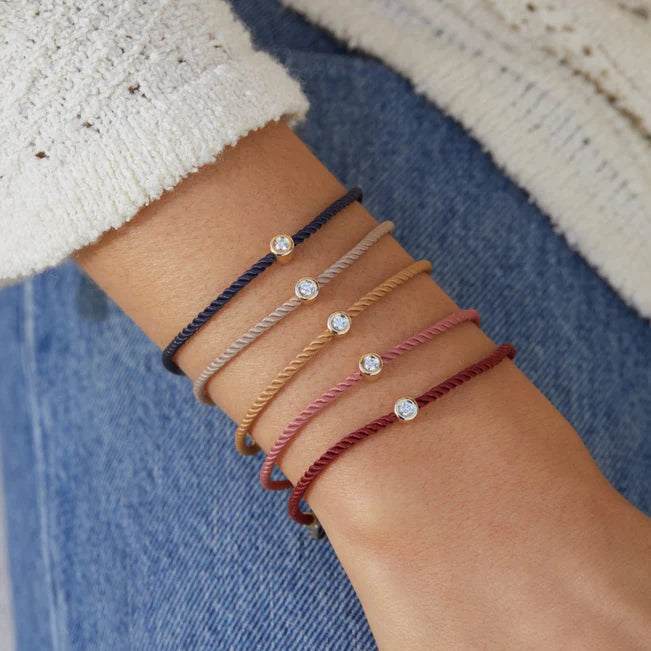 EF Collection Diamond Pillow Cord Bracelet In Peony on models wrist. 