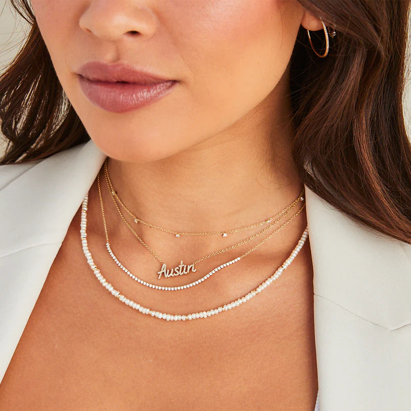 EF Collection Diamond Segment Necklace in yellow gold layered on models neck