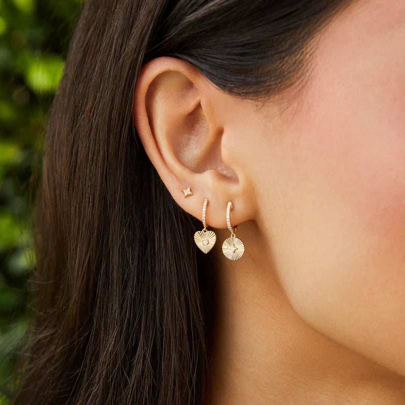 EF Collection Diamond Sparkle Stud Earring in yellow gold on models ear. 