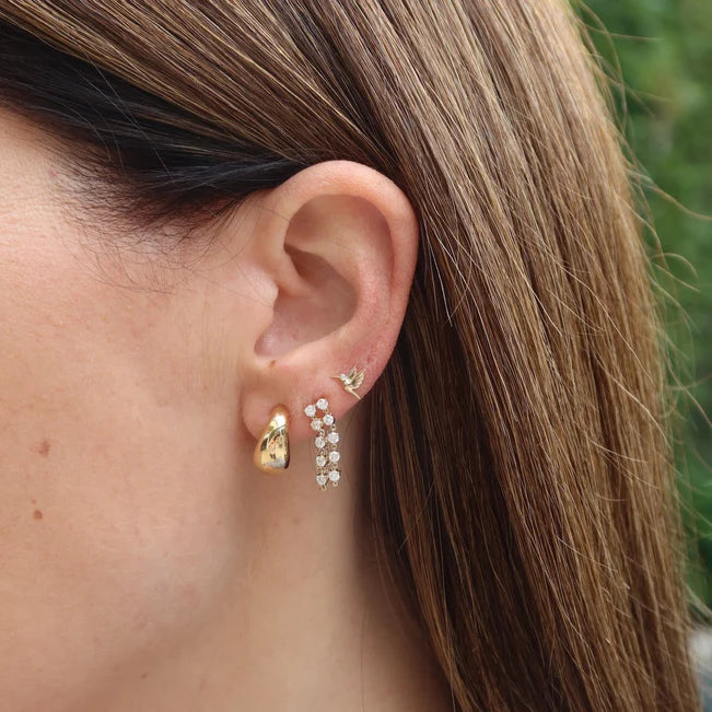 EF Collection Double Multi Diamond Chain Stud Earring in yellow gold on models ear with gold hoop. 