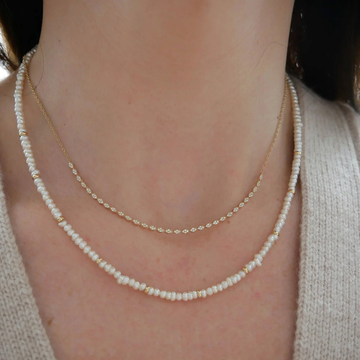 EF-Collection Birthstone Bead Necklace In Pearl styled on models neck with half tennis necklace