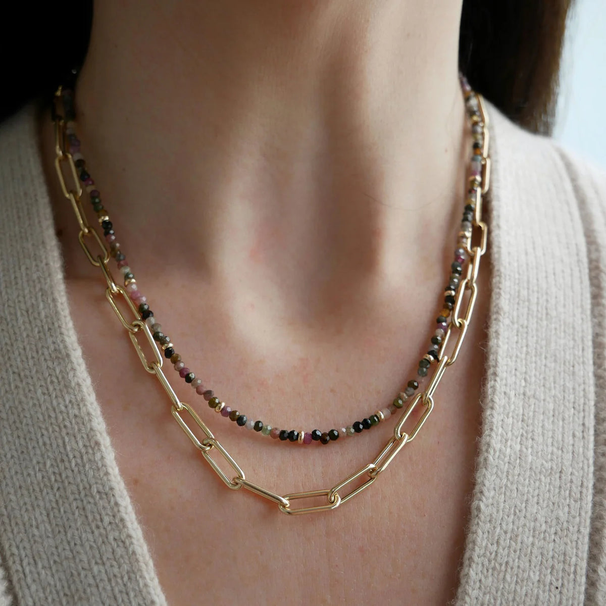 EF-Collection Birthstone Bead Necklace In Tourmaline in yellow gold styled on models neck with jumbo chain necklace 