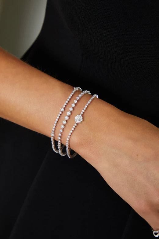 EF-Collection Oval Diamond Daphne Eternity Bracelet in white gold styled on models wrist 