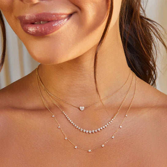 EF-Collection Full Cut Diamond Heart Choker Necklace in yellow gold on models neck with the graduated diamond necklace 