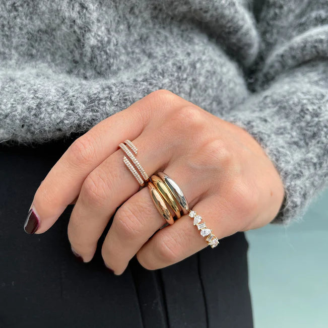 EF Collection Gold Dome Ring styled on model’s finger in three colors. Yellow, white and rose. 