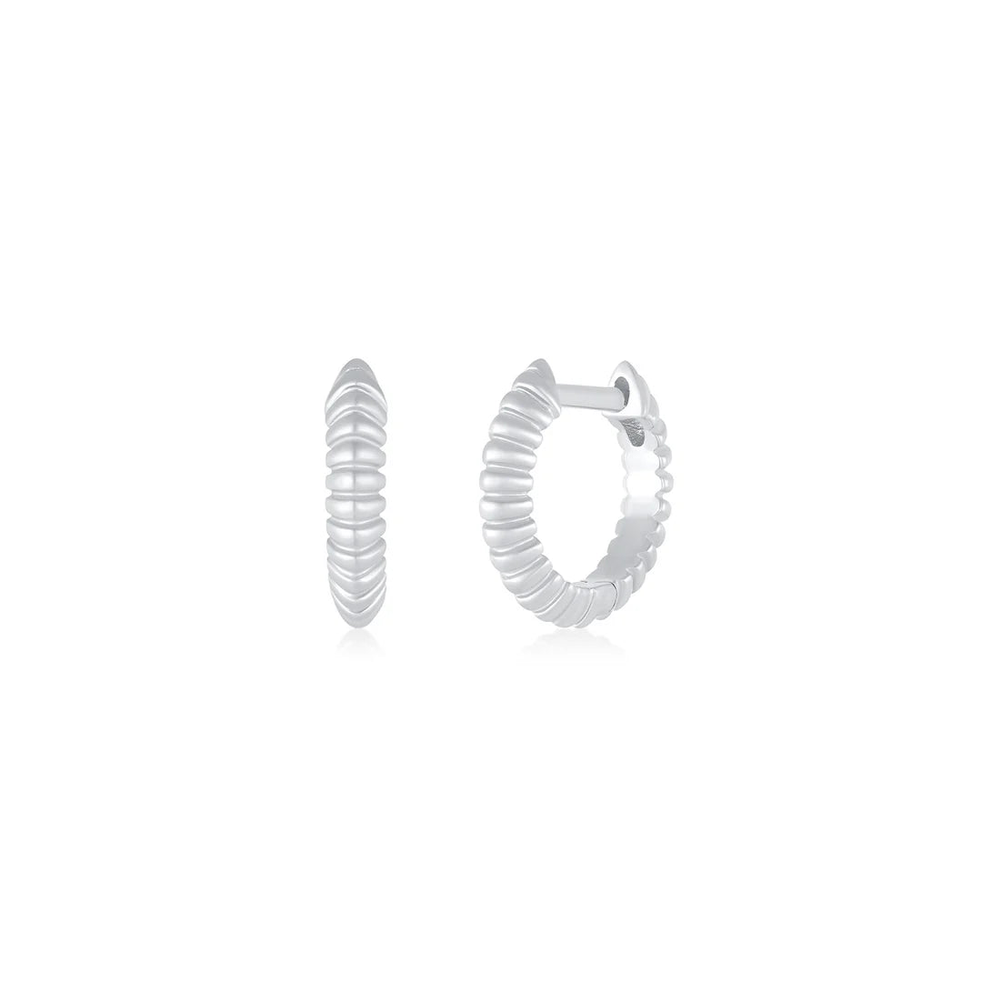 EF-Collection Gold Fluted Knife Edge Mini Huggie Earrings in white gold on white background 