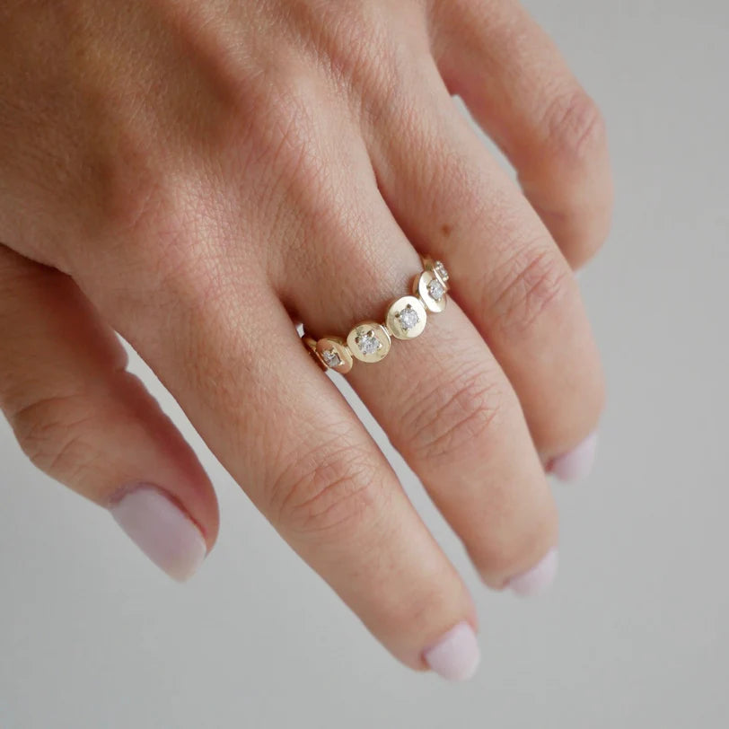 Single EF Collection Gold Frame Diamond Ring in yellow gold on model’s finger 