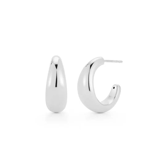 EF-Collection Gold Jumbo Dome Hoop Earrings in white gold on white background 