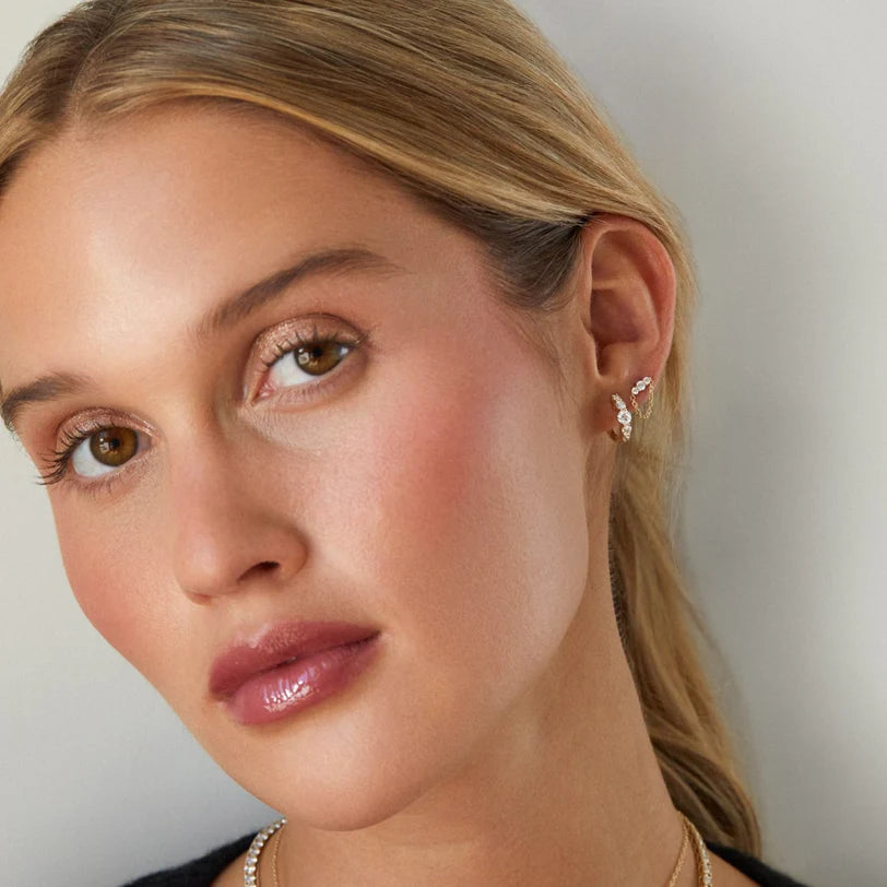 EF Collection Graduated Diamond Bar Chain Stud Earring in yellow gold styled on models ear. 