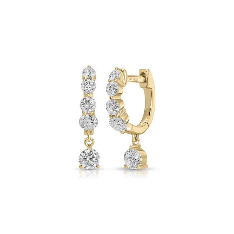 EF Collection Graduated Diamond Drop Mini Huggie Earrings in yellow gold on white background. 