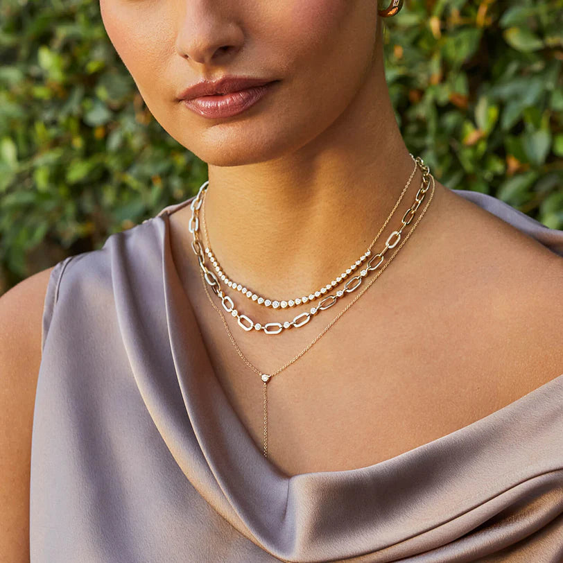 EF Collection Graduated Diamond Pillow Necklace in yellow gold styled on models neck 