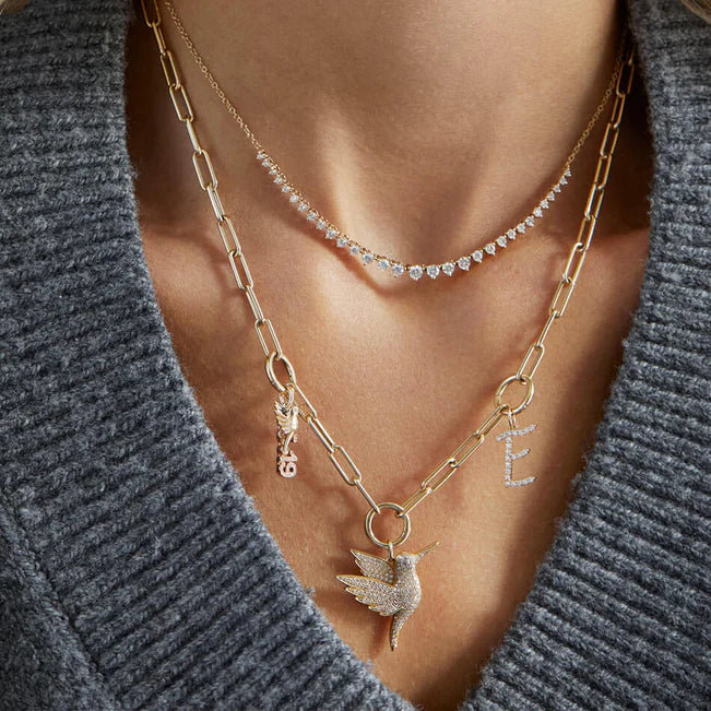 EF Collection Lola Triple Enhanced Chain Necklace in yellow gold styled on models neck with charms