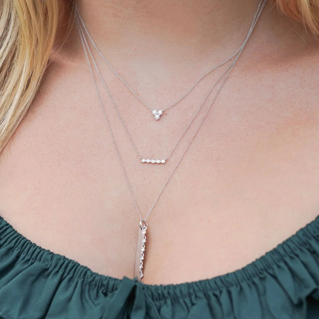 shot of a model wearing Dana Rebecca Designs Lulu Jack Mini Bezel Bar Necklace in white Gold