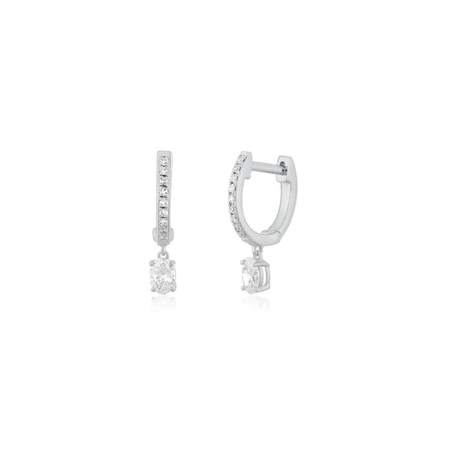 EF Collection Oval Drop Diamond Mini Huggie Earring in white gold on white background. 