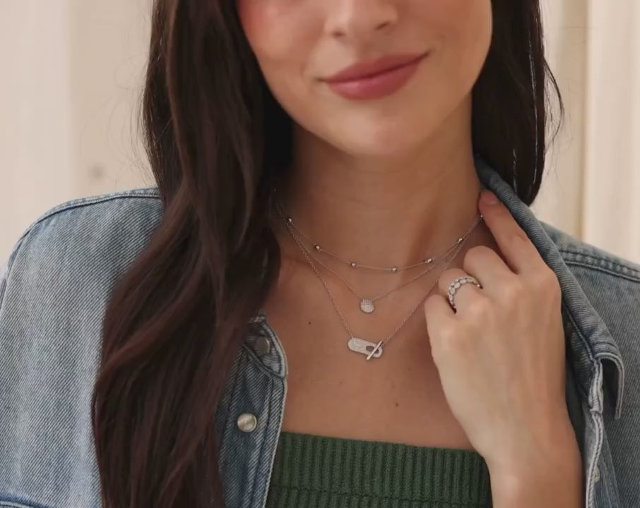 Video of Dana Rebecca Designs Sylvie Rose Pavé Toggle Necklace in white gold on models neck 