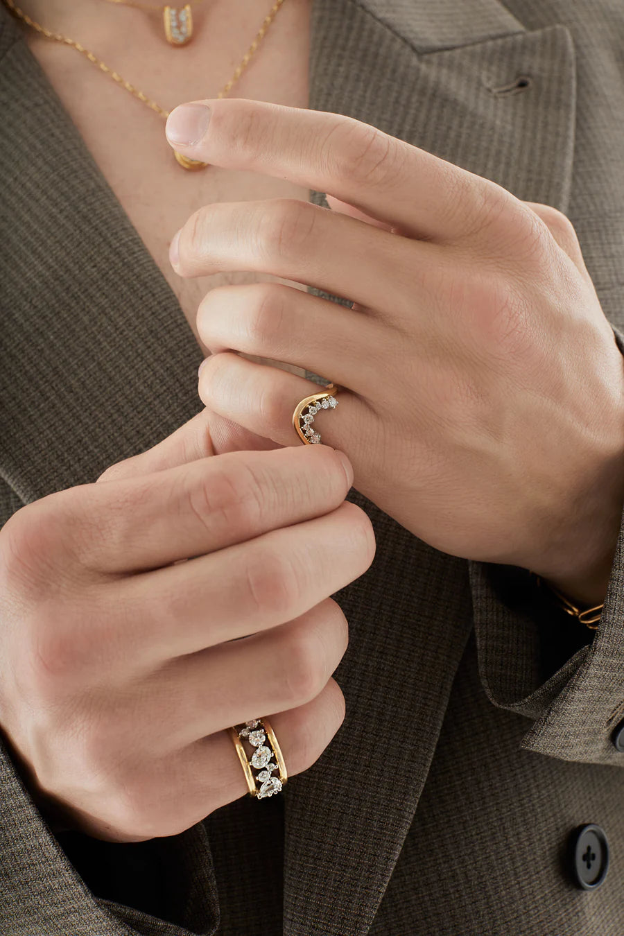 Rosario Navia Mara Curved Ring I in yellow gold styled on models pinky finger 
