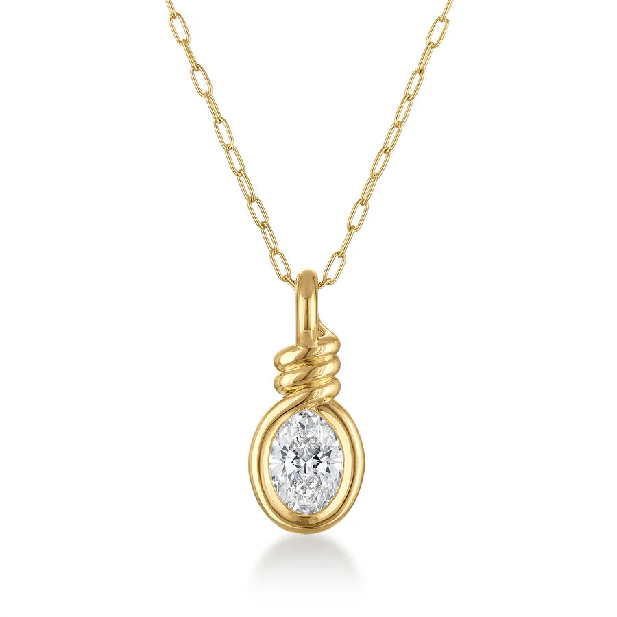 Rosario Navia Twist Pendant Oval Cut Diamond in yellow gold on white background.