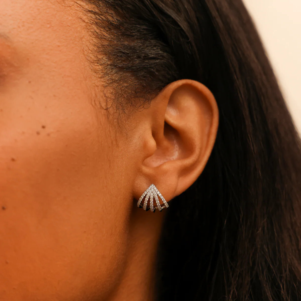 close up of Dana Rebecca Designs Sarah Leah Five Burst Huggies in rose Gold on model