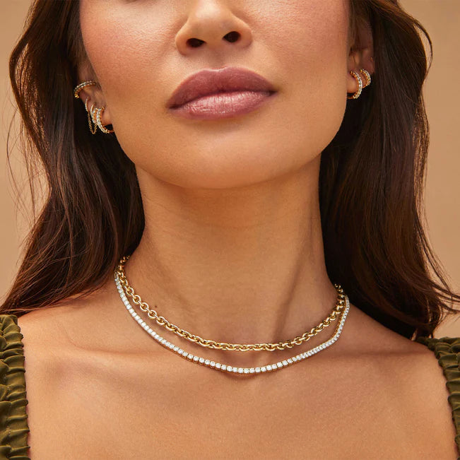 EF-Collection Sienna Chain Necklace in 14k gold styled with a diamond tennis necklace on models neck


