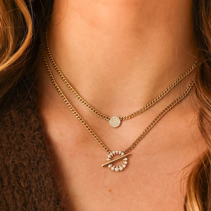 Dana Rebecca Designs Sophia Ryan Cuban Chain Toggle Necklace in yellow gold on models neck with lauren joy disc necklace 