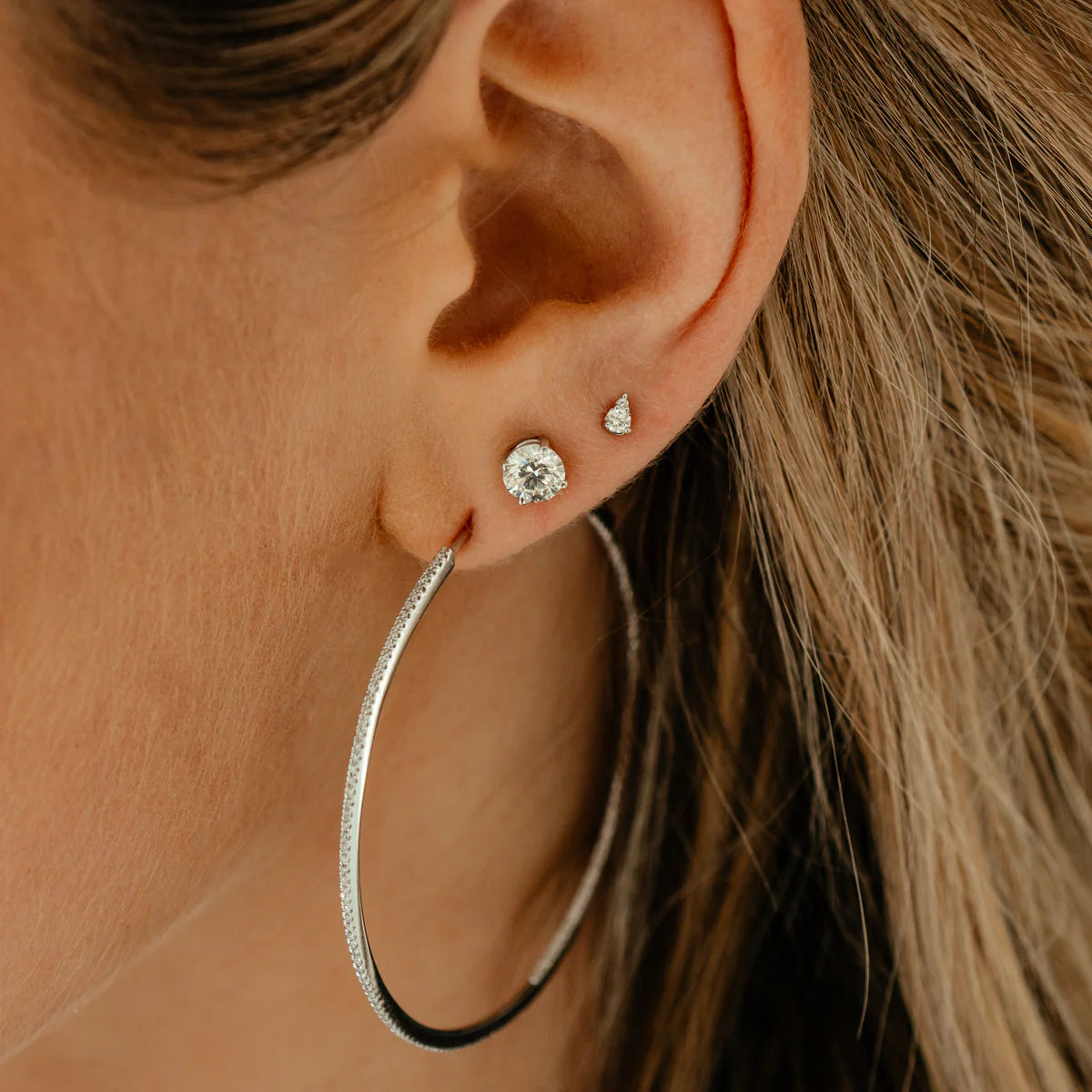 close up of Dana Rebecca Designs Sophia Ryan Petite Teardrop studs in white gold on model