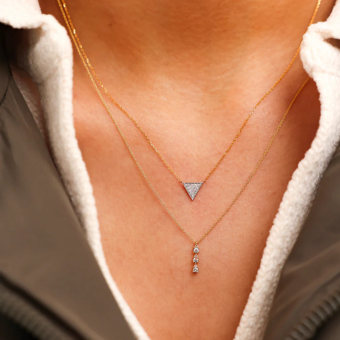 Dana Rebecca Designs Sophia Ryan Triple Teardrop Necklace in yellow gold on models neck 