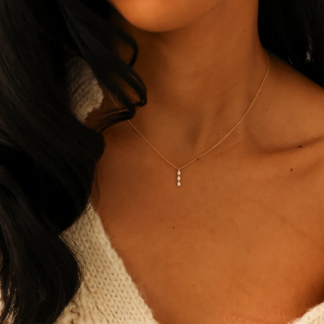 Single Dana Rebecca Designs Sophia Ryan Triple Teardrop Necklace in yellow gold on models neck 