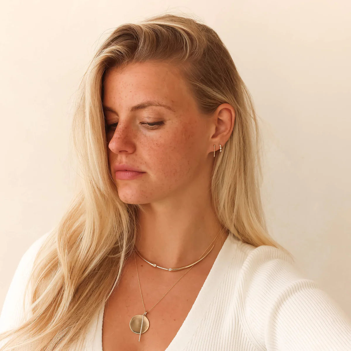 Dana Rebecca Designs Taylor Elaine Collar Necklace in yellow gold styled on models neck 