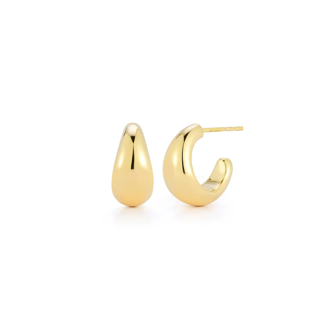 EF-Collection The Gold Jumbo Dome Huggie Earrings in yellow gold on white background 
