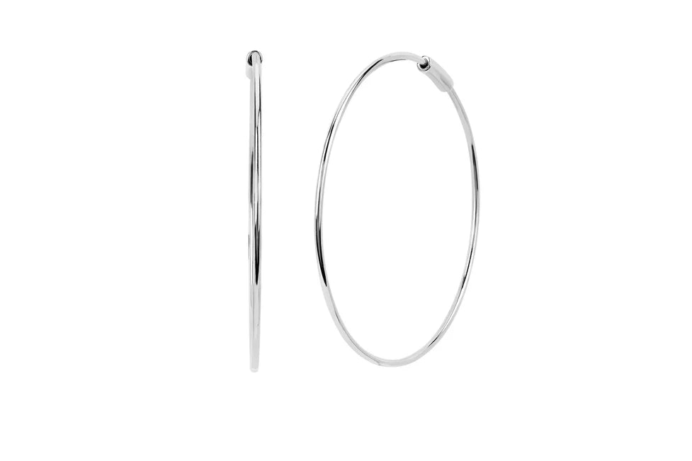EF Collection The Perfect Gold Hoop Earrings in white gold on white background. 